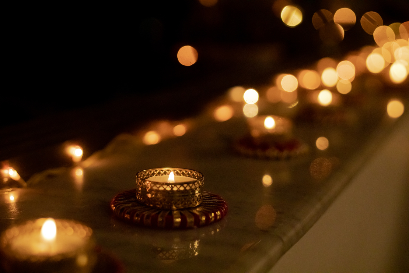 Lighted Candles on Windowsill